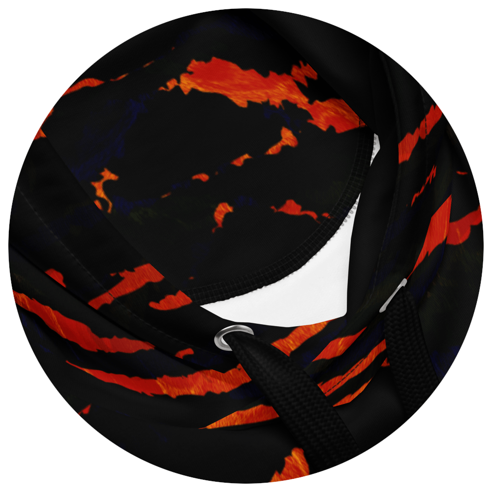 UN4RT tiger lily hoodie hood detail – circular close-up of drawstring hood opening showing fiery orange-red tiger stripe print on black fabric interior and exterior, silver metal eyelets visible.