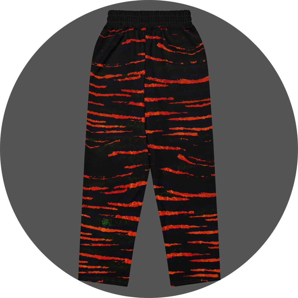 UN4RT tiger lily all-over-print jogging pants back flat – black sweatpants with bold orange-red tiger stripe pattern, two back pockets visible, elasticated waistband and small UN4RT logo at ankle.
