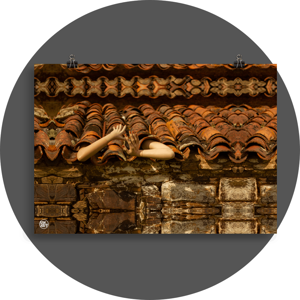 un4rt - a photographie that is mirrored on all sides. the image shows an old roof with arms coming out of the roof tiles. front view. ancient stone wall with big stones under the roof.