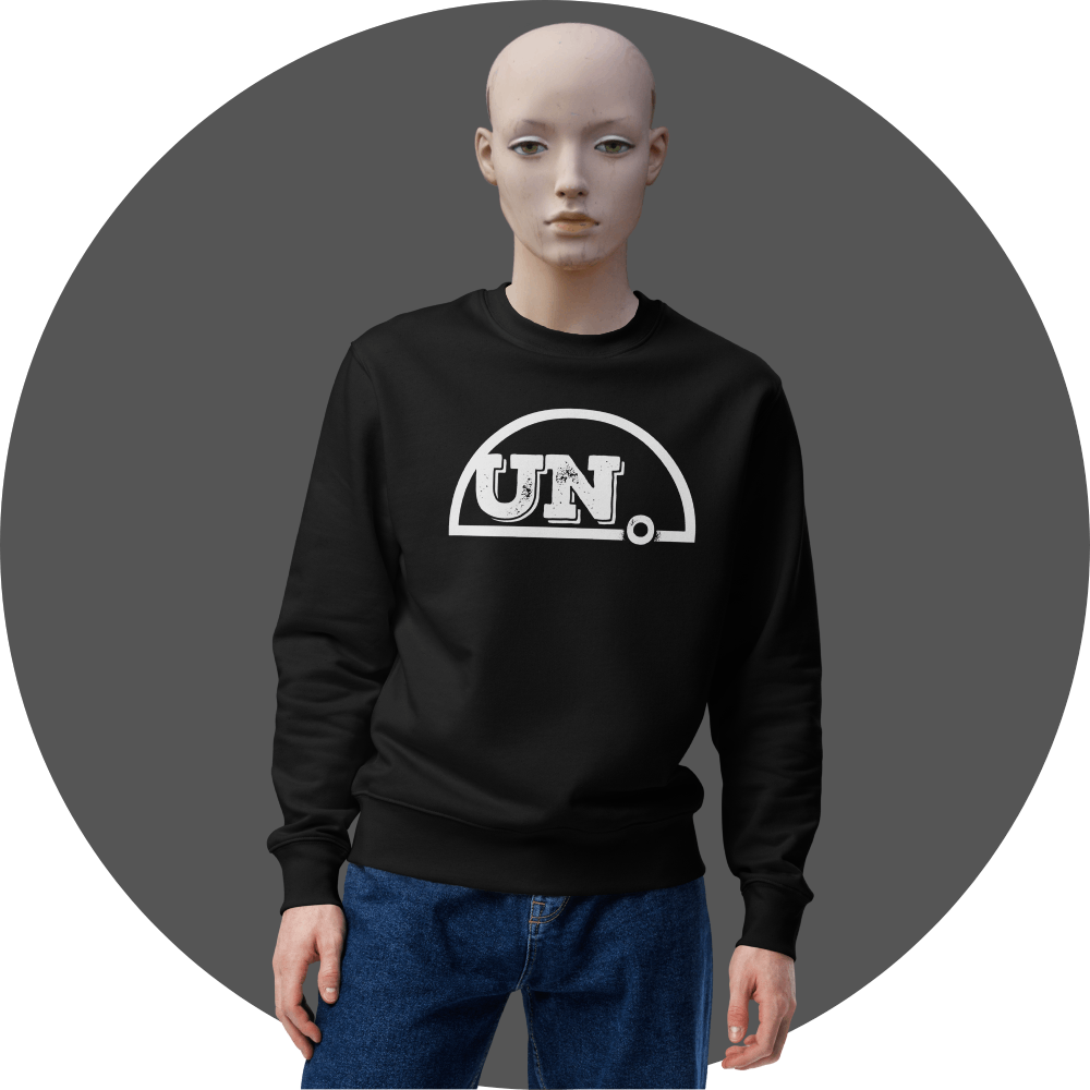UN4RT black crewneck sweatshirt, large distressed white "UN." semicircle logo centered on chest, relaxed fit, mannequin front view, grey circular background.