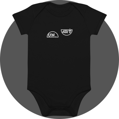 un4rt - the images shows the front of a black certified organic cotton baby bodysuit with white embroidery of the splitted "UN4RT"-logo.