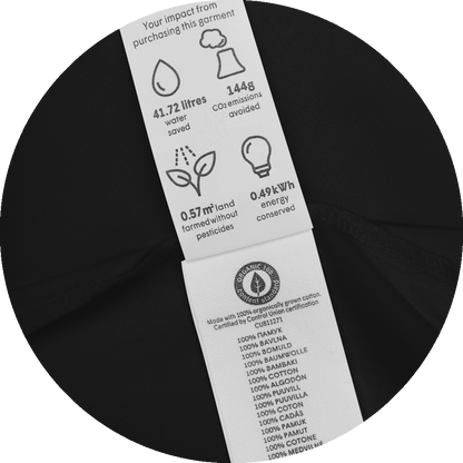 un4rt - the images shows the inside label of a black certified organic cotton baby bodysuit. various informations are printed on the label.