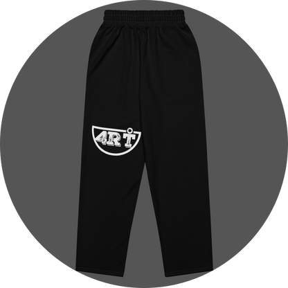 un4rt - the image shows the back of a black jogger pant with a white print of the lower part of the "UN4RT"-logo on the left leg.