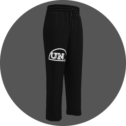 un4rt - the image shows the front of a black jogger pant with a white print of the upper part of the "UN4RT"-logo on the right leg.