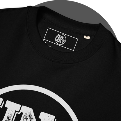 un4rt - the image shows details of the front of a black organic cotton sweatshirt with a part of a big white print of the upper part of the "UN4RT"-logo and an inprinted neck label with the "UN4RT"-logo.