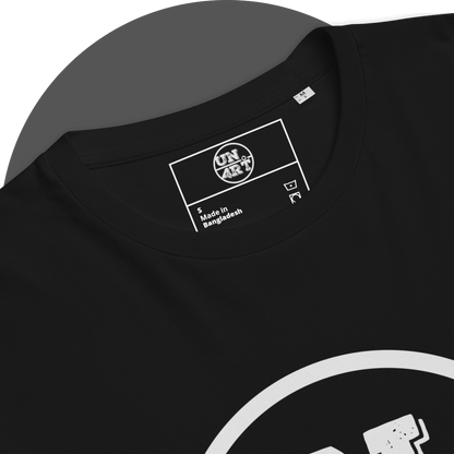 UN4RT black organic cotton t-shirt inner neck label with label logo, care symbols, upper arc of the white semicircle graphic partially visible below.